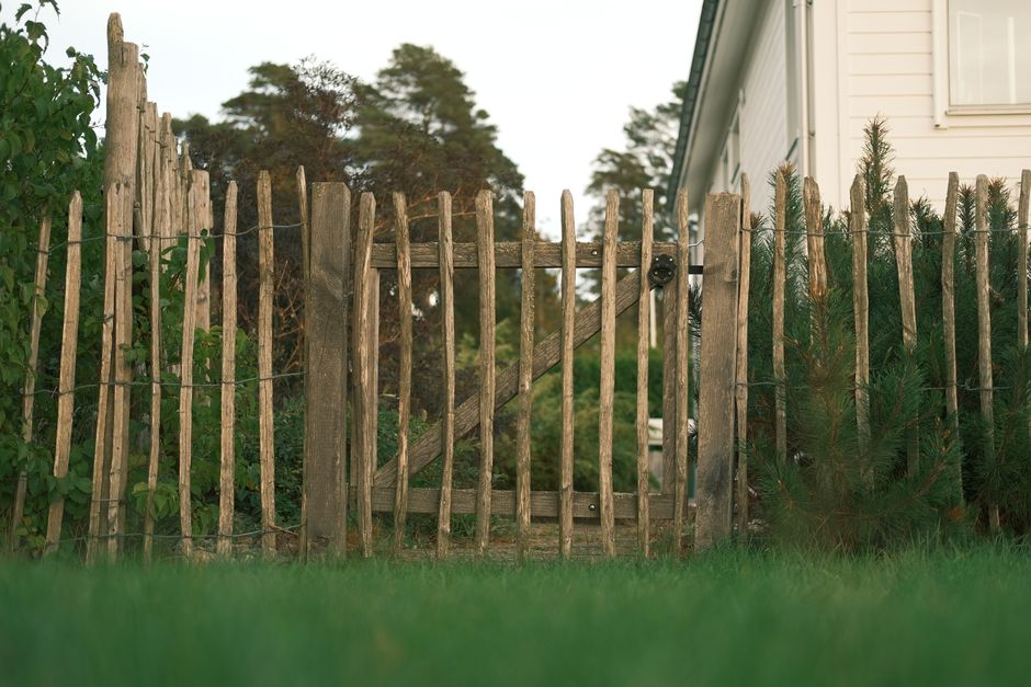 Wood fence installation in a yard